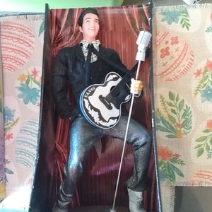 Vintage Elvis Presley's animated musical doll.